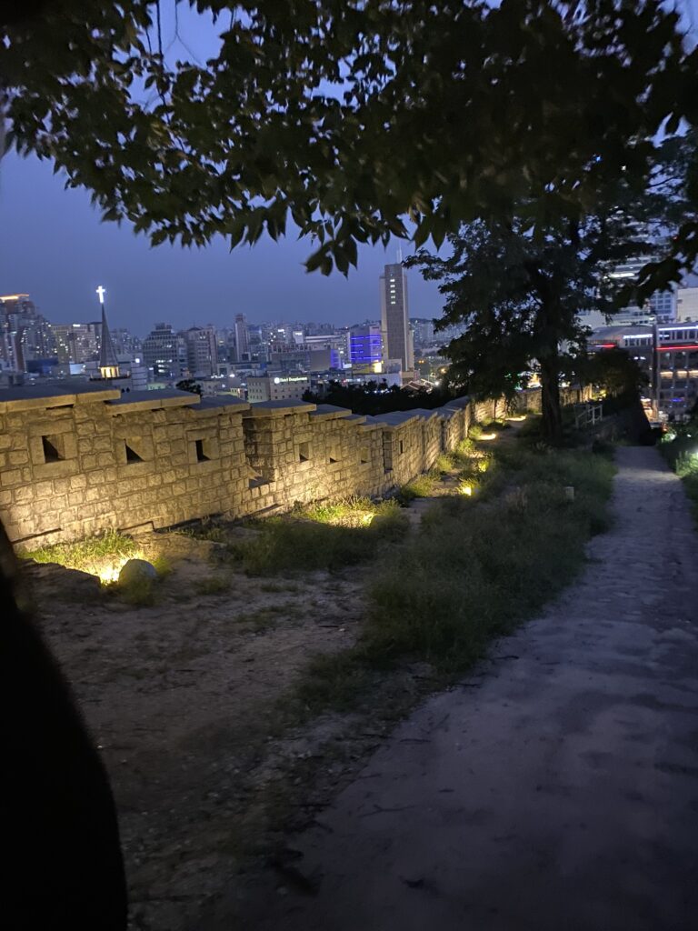 Illuminated Seoul City Wall at Naksan Park at night