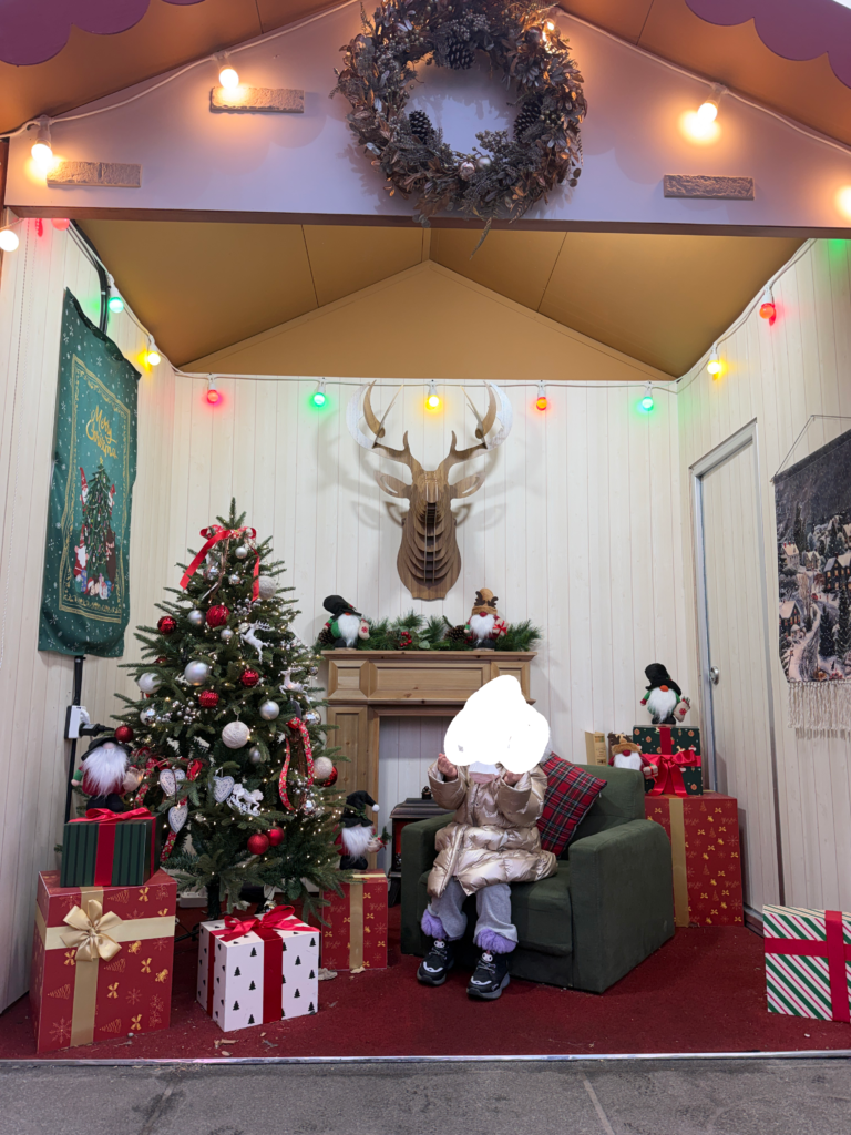 Cozy Christmas photo booth with tree and decorations at the Gwanghwamun Christmas Market in Seoul