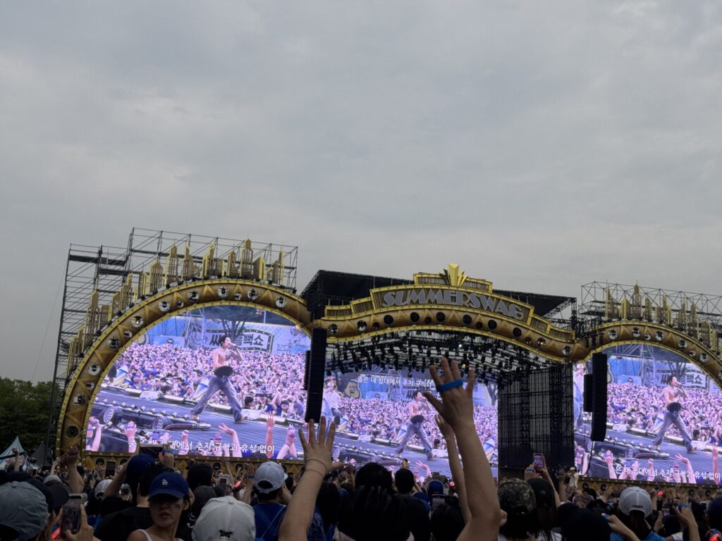 PSY performing on the main SUMMER SWAG stage screens in Seoul