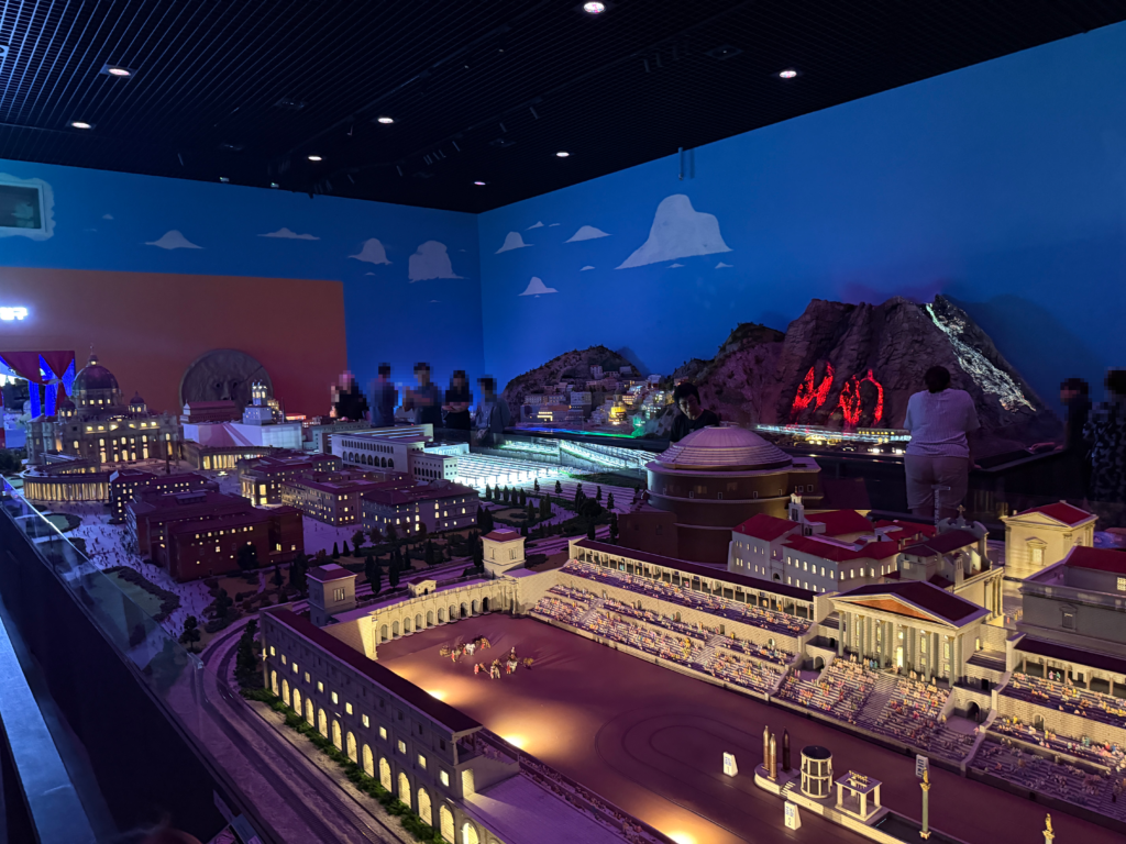Wide night view of the illuminated Italy Hall miniature diorama at Nowon Train Village, Seoul