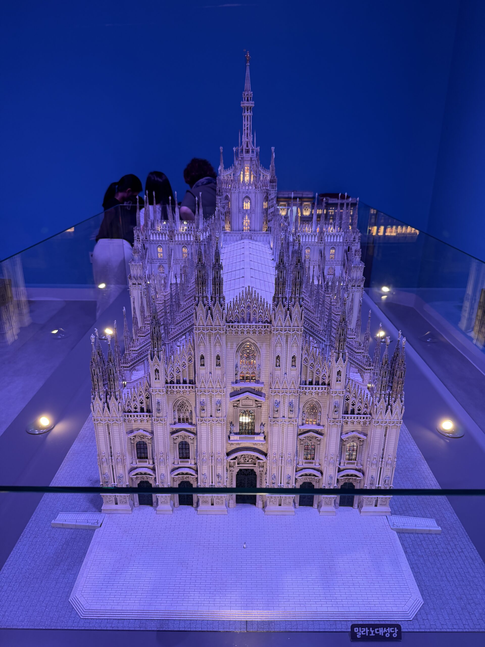 Miniature model of Milan Cathedral (Duomo di Milano) under blue lighting at Nowon Train Village