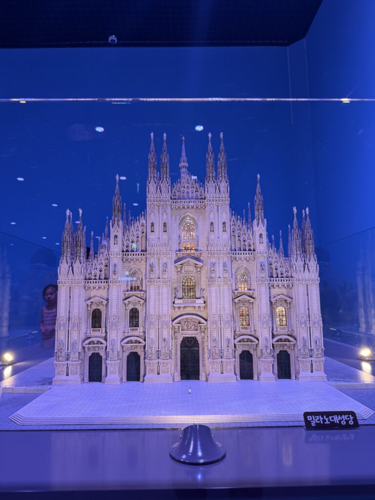Miniature model of Milan Cathedral (Duomo di Milano) under blue lighting at Nowon Train Village