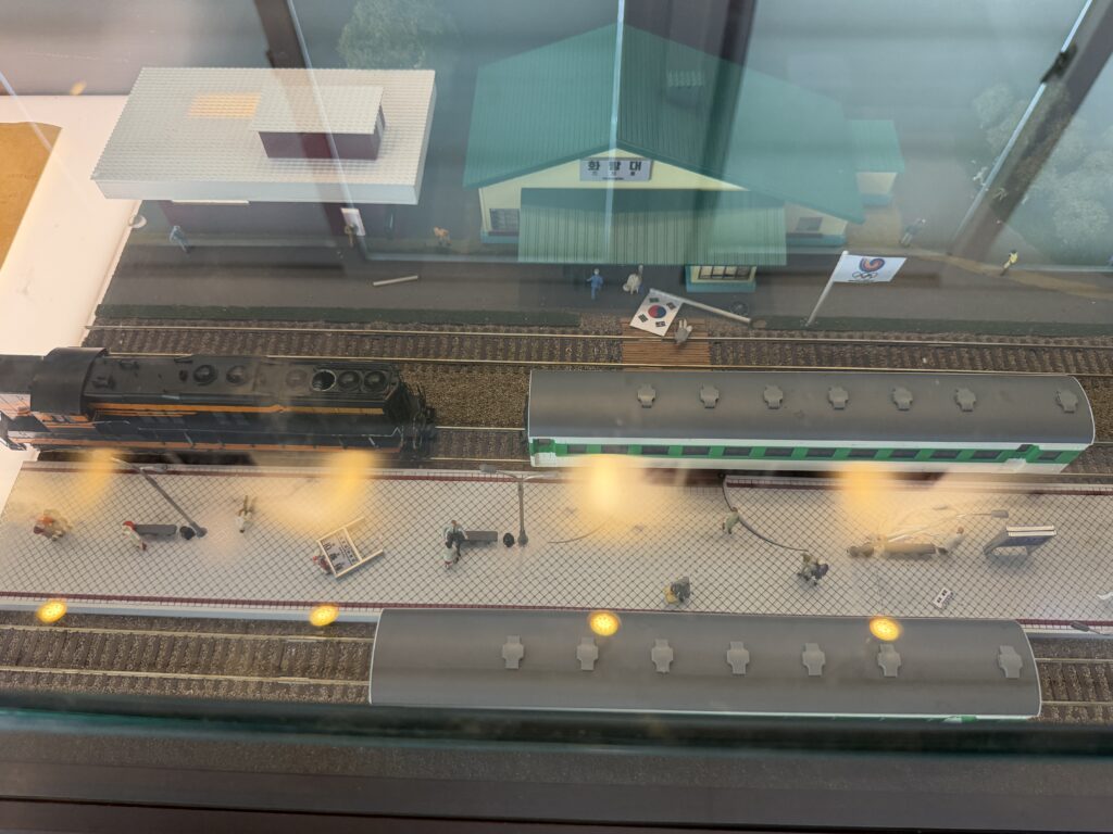 Miniature diorama of Hwarangdae Station platform with model trains