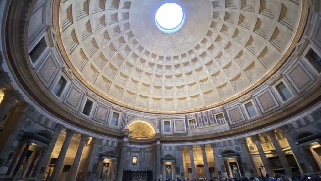 Interior of the Pantheon in Rome, looking up at the coffered dome and open oculus