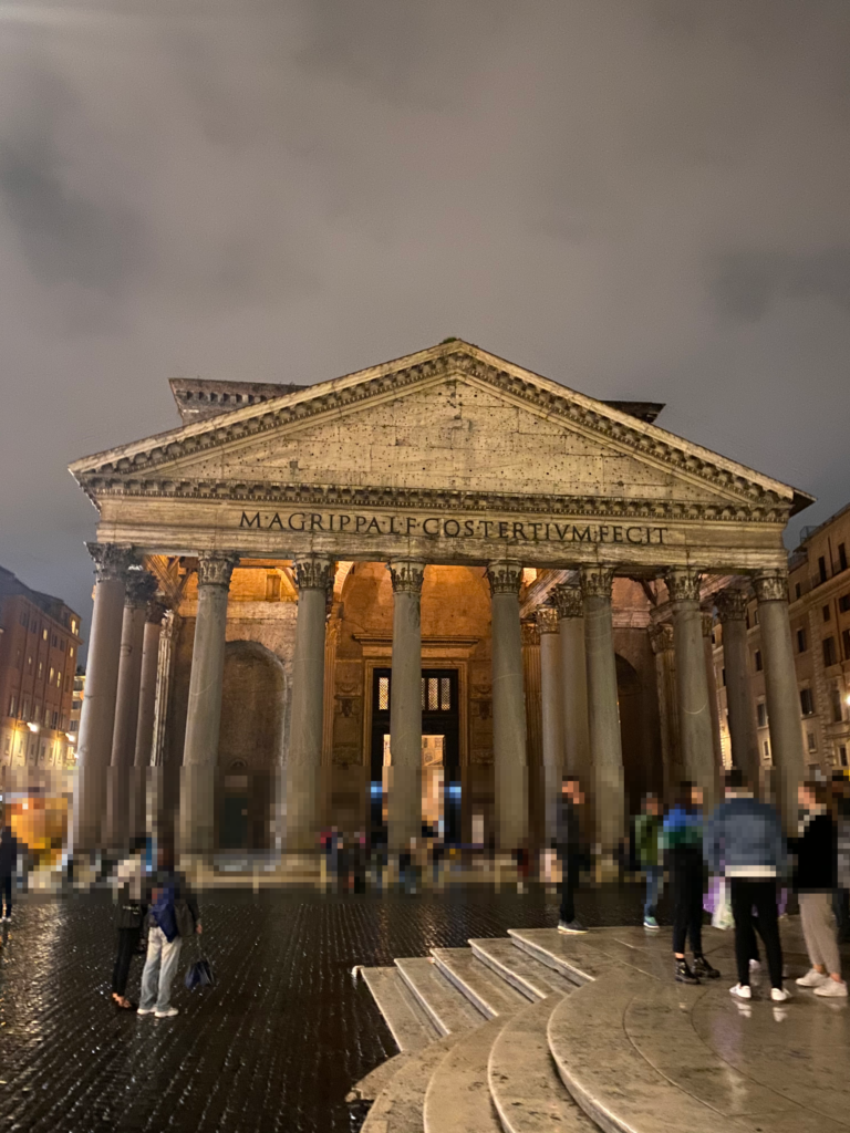 The Pantheon in Rome illuminated at night after rain
