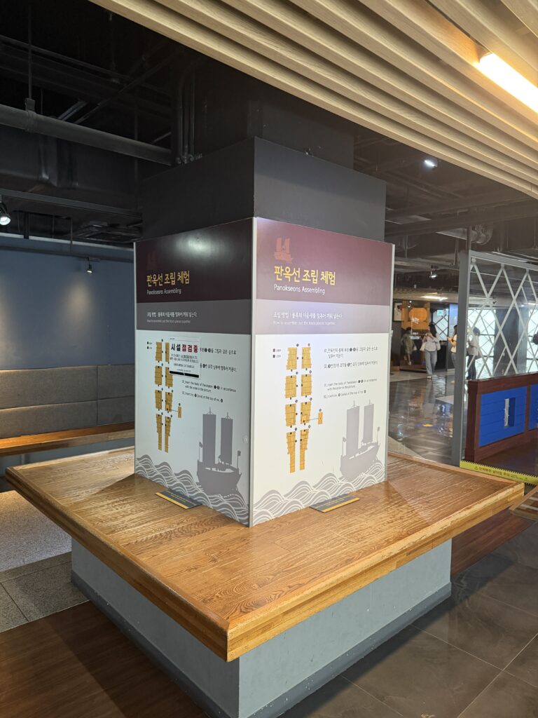 Panokseon ship assembly activity station with illustrated instructions at The Story of Admiral Yi Sunshin